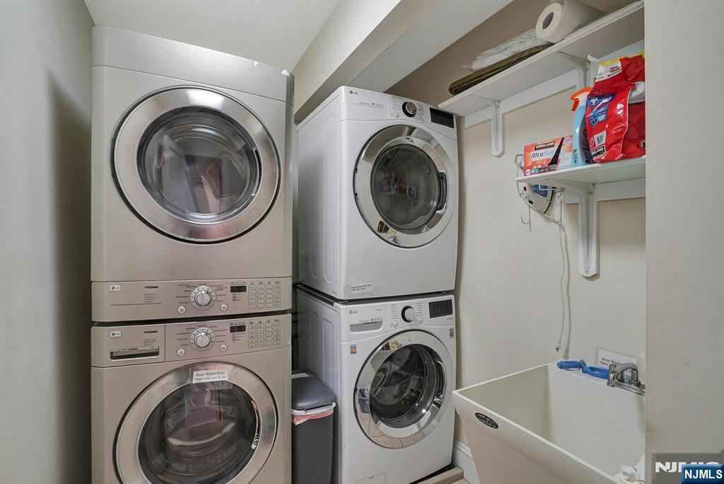 599 Point Avenue Brick, NJ 08724 - Photo 32 of 48 a view of a hallway with washer and dryer