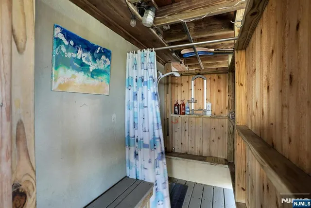 a view of swimming pool with outdoor seating and a yard