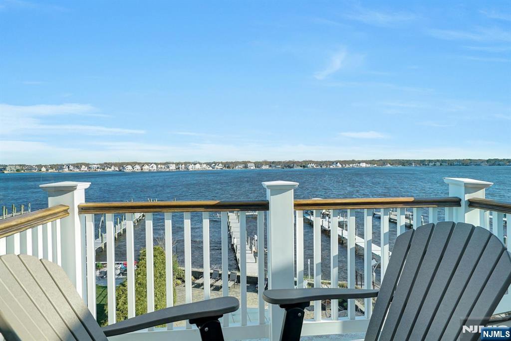 599 Point Avenue Brick, NJ 08724 - Photo 44 of 48 a view of a balcony with wooden floor and outdoor space