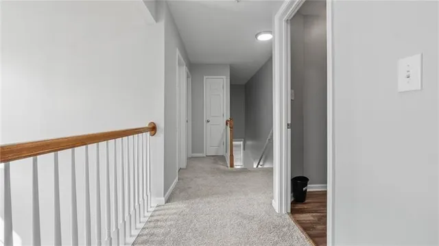 a view of hallway with livingroom