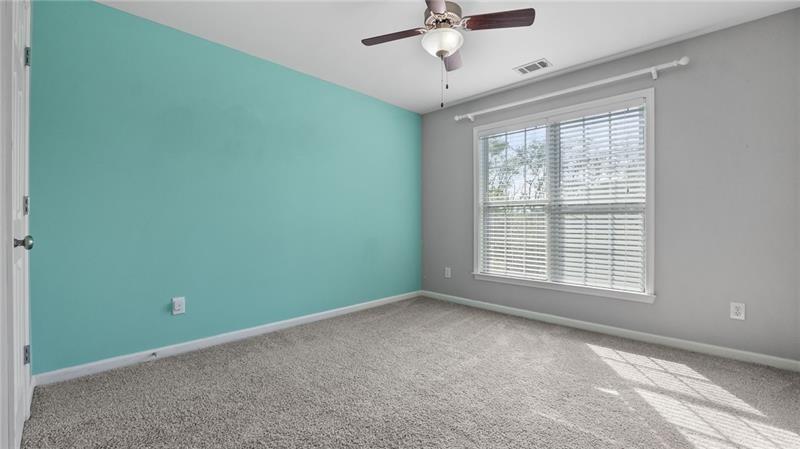 3525 Elder Field Lane Cumming, GA 30040 - Photo 25 of 45 a view of an empty room with a window