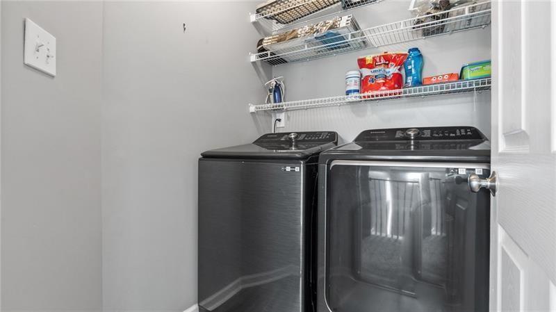 3525 Elder Field Lane Cumming, GA 30040 - Photo 29 of 45 a utility room with dryer and washer
