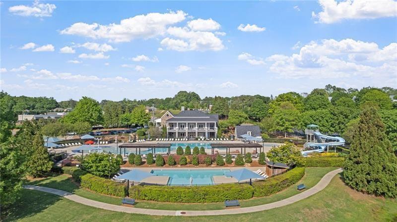 3525 Elder Field Lane Cumming, GA 30040 - Photo 37 of 45 a view of a swimming pool in front of the house