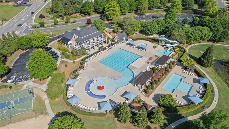3525 Elder Field Lane Cumming, GA 30040 - Photo 38 of 45 an aerial view of a house with a swimming pool and outdoor seating