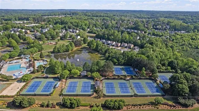 a view of a lake with a yard