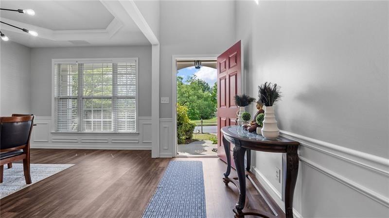 3525 Elder Field Lane Cumming, GA 30040 - Photo 7 of 45 a view of a workspace with furniture and a window