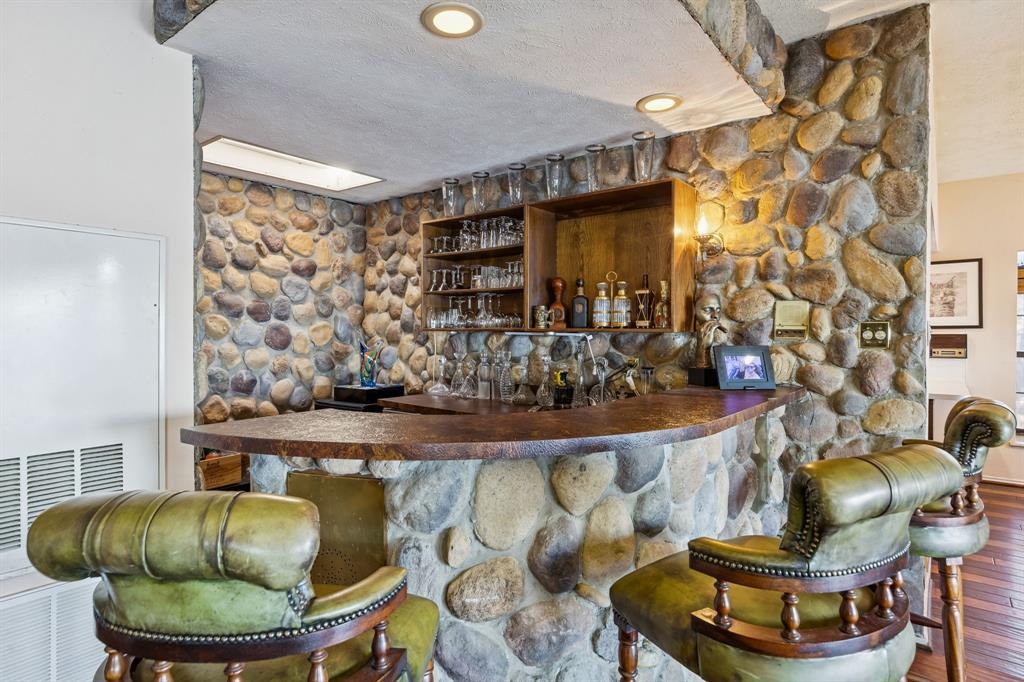 4548 Chaha Road, Unit 203 Garland, TX 75043 - Photo 13 of 18 a living room with a couch and a table