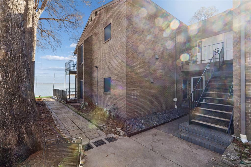 4548 Chaha Road, Unit 203 Garland, TX 75043 - Photo 18 of 18 a view of a pathway of a house