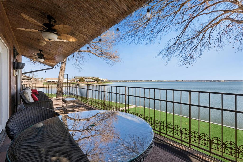 4548 Chaha Road, Unit 203 Garland, TX 75043 - Photo 3 of 18 a balcony with furniture