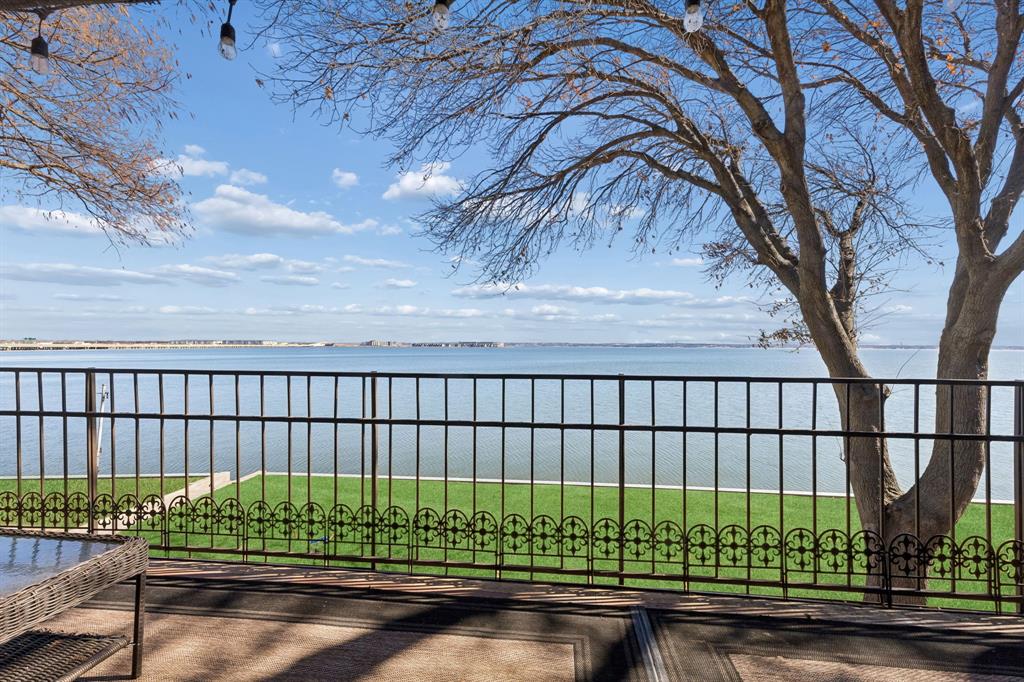 4548 Chaha Road, Unit 203 Garland, TX 75043 - Photo 4 of 18 a view of a street in a park