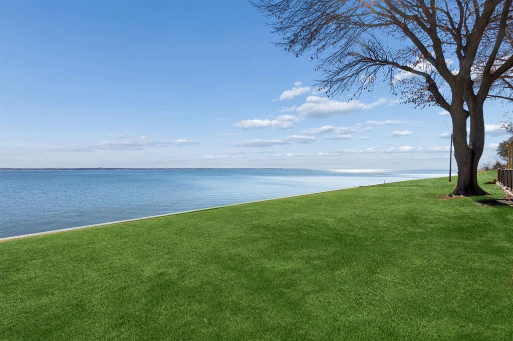 4548 Chaha Road, Unit 203 Garland, TX 75043 - Photo 6 of 18 a view of yard with swimming pool and green space