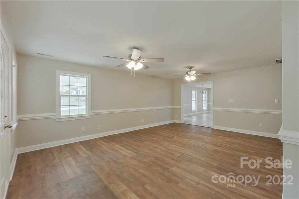 3804 Dusty Hollow Road Monroe, NC 28110 - Photo 17 of 42 a view of an empty room with a window