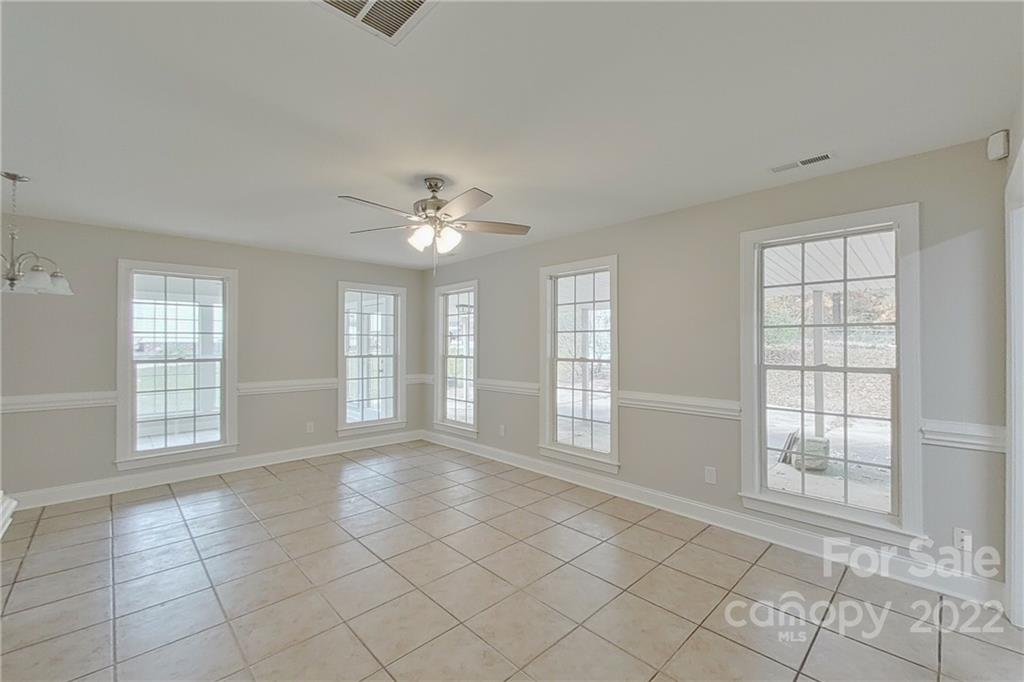 3804 Dusty Hollow Road Monroe, NC 28110 - Photo 26 of 42 a view of an empty room with a window