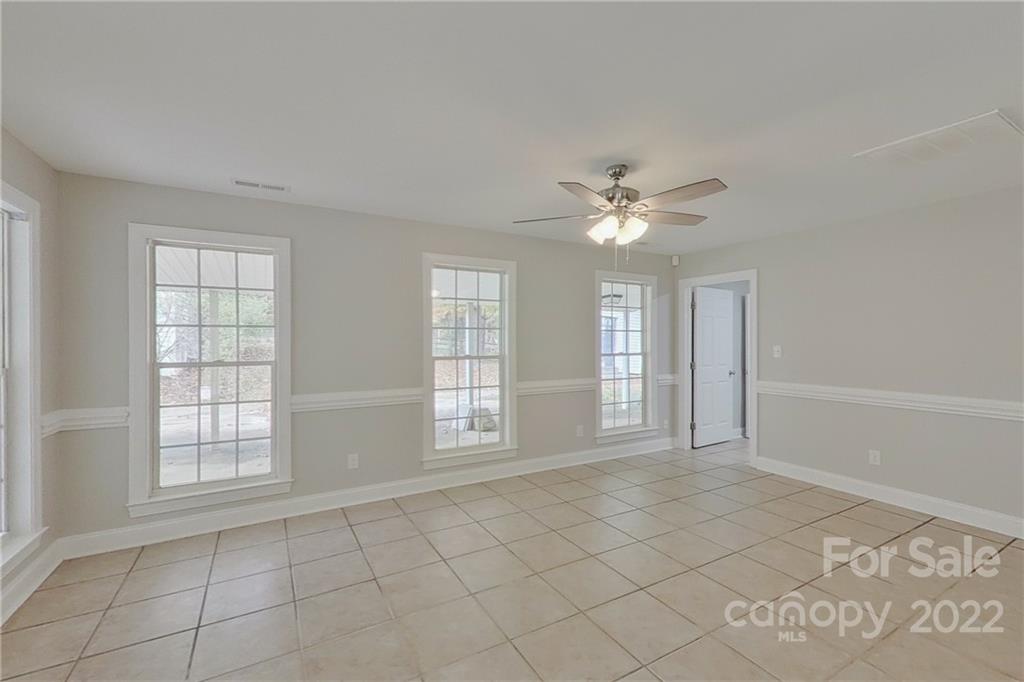 3804 Dusty Hollow Road Monroe, NC 28110 - Photo 29 of 42 a view of an empty room with a window