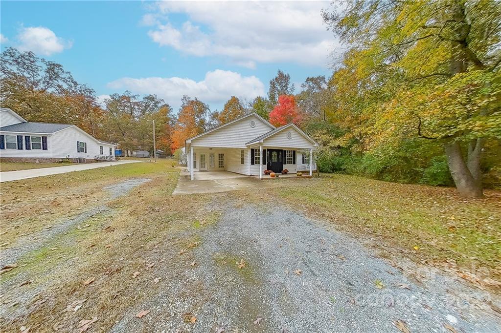 3804 Dusty Hollow Road Monroe, NC 28110 - Photo 37 of 42 a view of an house with backyard space and balcony