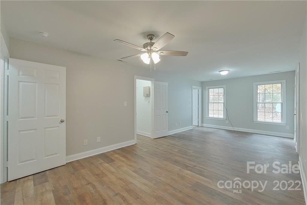 3804 Dusty Hollow Road Monroe, NC 28110 - Photo 4 of 42 a view of an empty room with a window