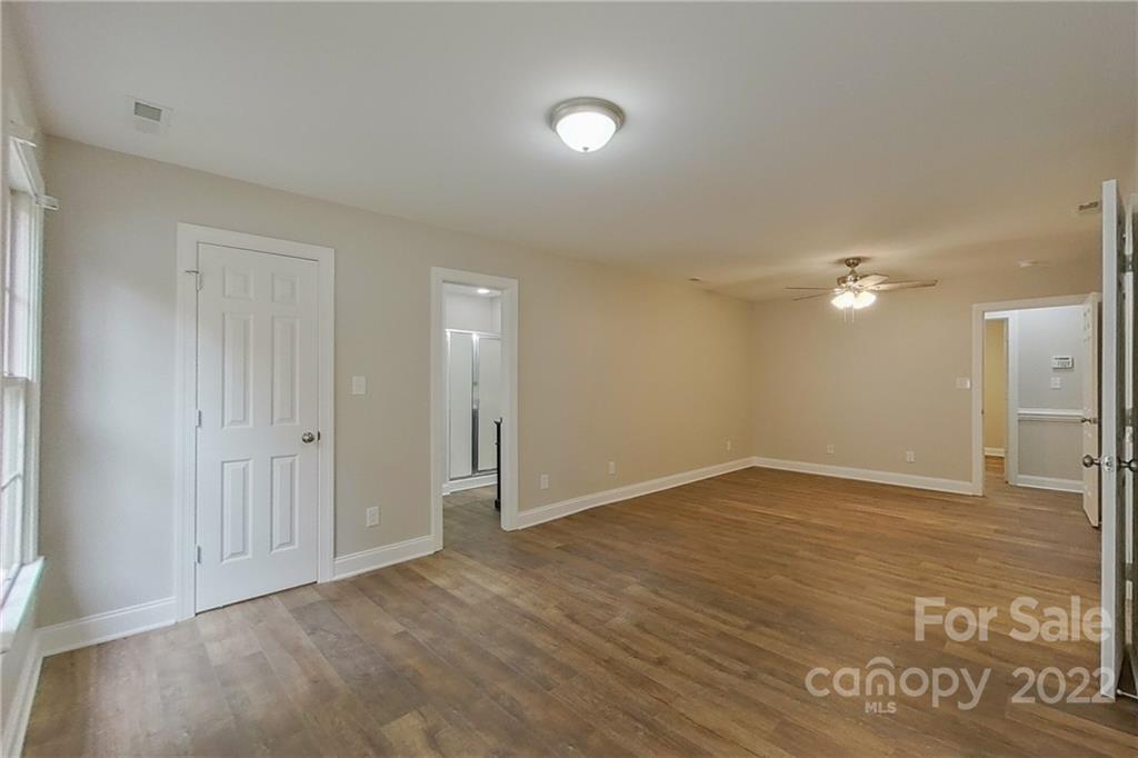 3804 Dusty Hollow Road Monroe, NC 28110 - Photo 5 of 42 wooden floor in an empty room