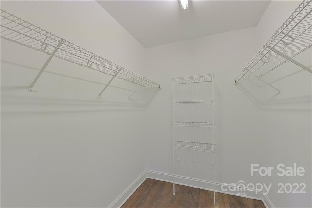 3804 Dusty Hollow Road Monroe, NC 28110 - Photo 10 of 42 a view of a room with racks on the wall