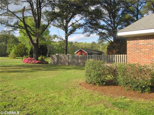 251 Mariners Point Road Hudgins, VA 23076 - Photo 2 of 12 Exterior Front - Large corner lot feels larger than one acre