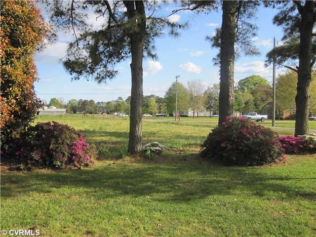 251 Mariners Point Road Hudgins, VA 23076 - Photo 6 of 12 Exterior Front - Just lovely! Property has matured trees, shrubs and gardens.