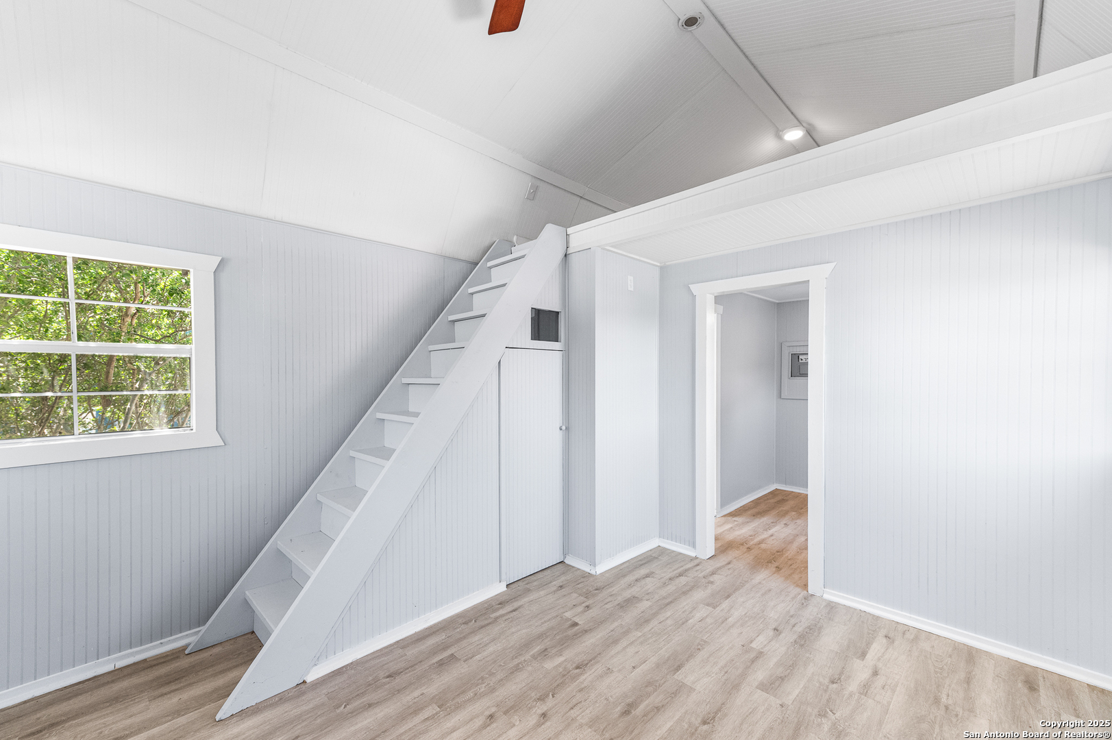 9130 Rebecca Creek Road Spring Branch, TX 78070 - Photo 49 of 77 a view of entryway with wooden floor and stairs