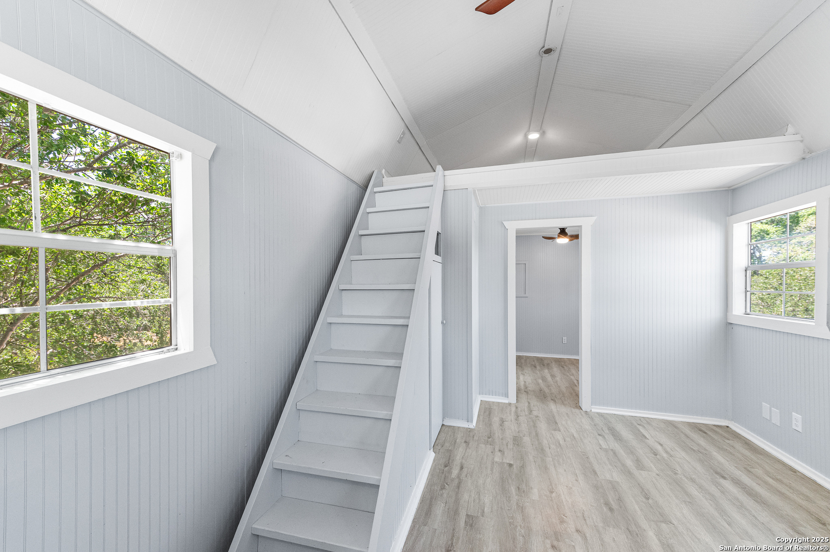 9130 Rebecca Creek Road Spring Branch, TX 78070 - Photo 52 of 77 a view of entryway with wooden floor and windows