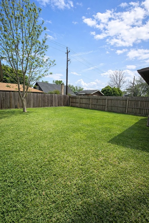 4415 Seminole Street Pasadena, TX 77504 - Photo 13 of 13 a view of a big yard with a house