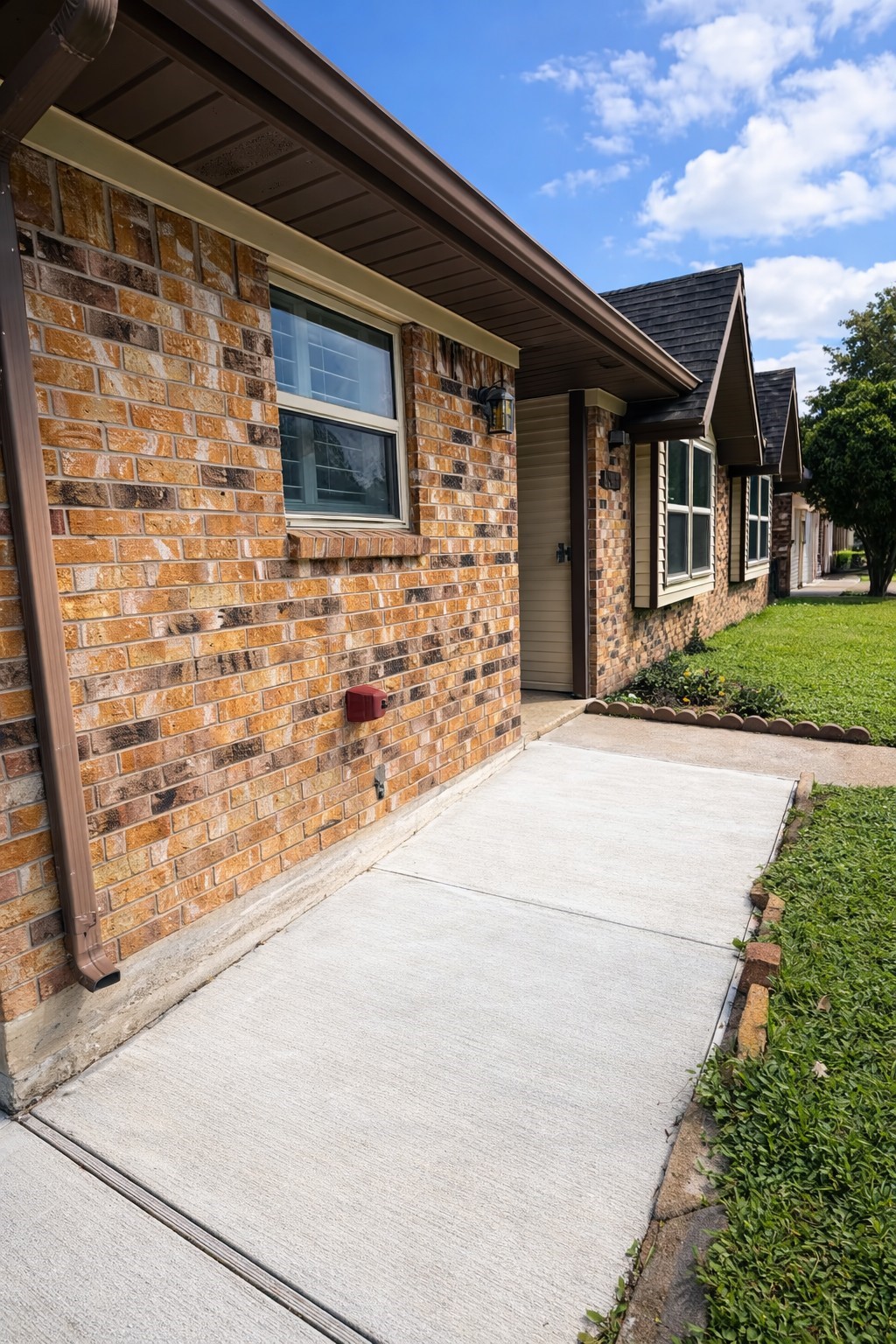 4415 Seminole Street Pasadena, TX 77504 - Photo 3 of 13 a front view of a house with a yard and garage