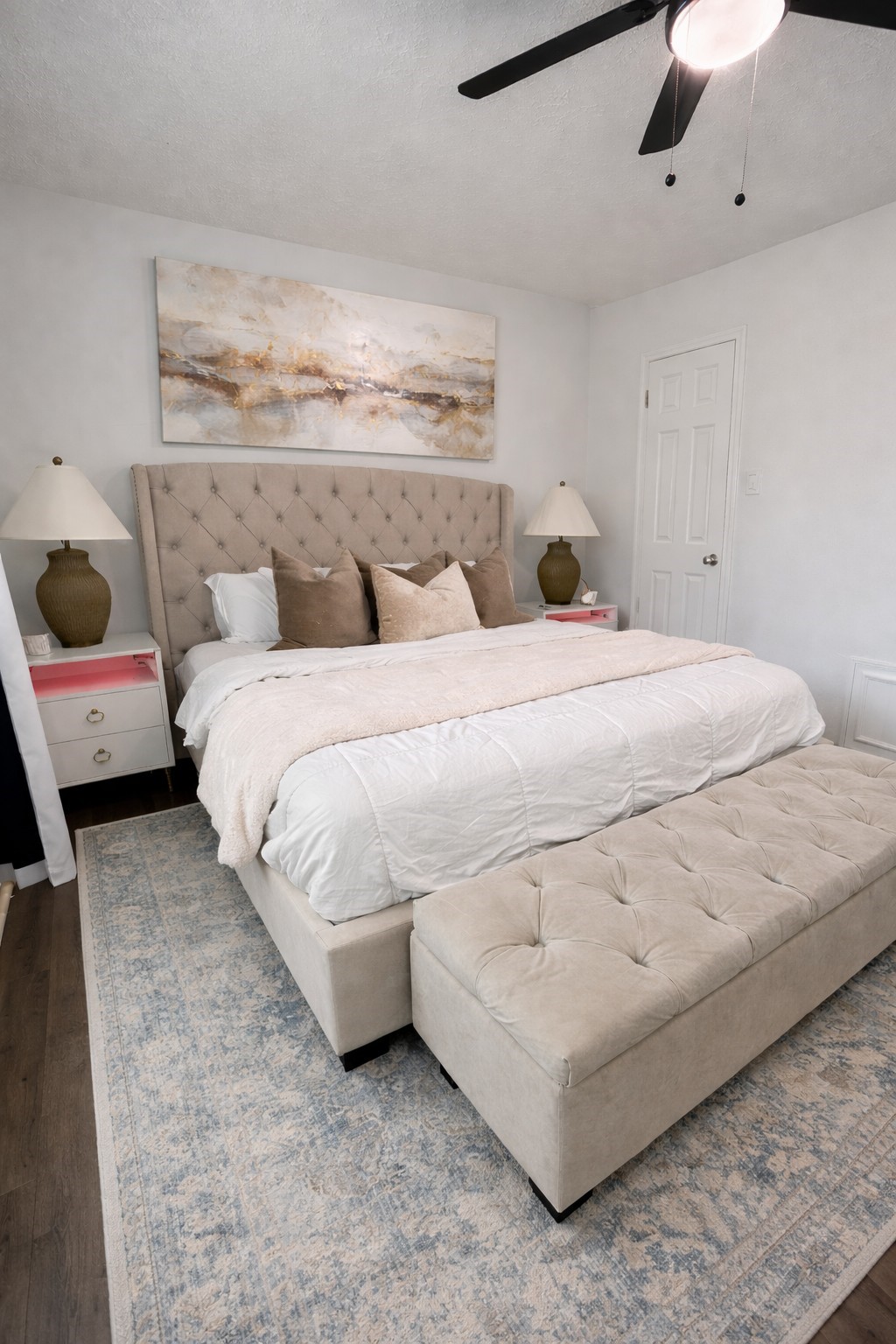 4415 Seminole Street Pasadena, TX 77504 - Photo 9 of 13 a large white bed sitting in a bedroom and table