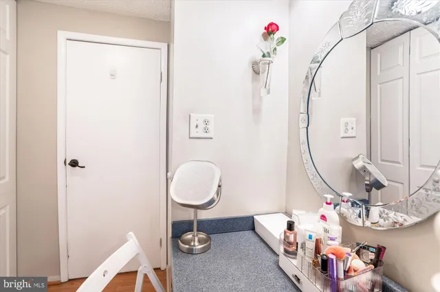 a view of a hallway with dining room and utility room
