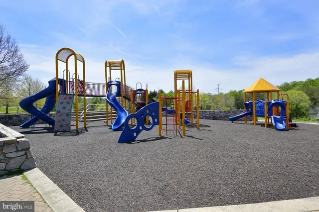 a view of a livingroom with furniture and toys