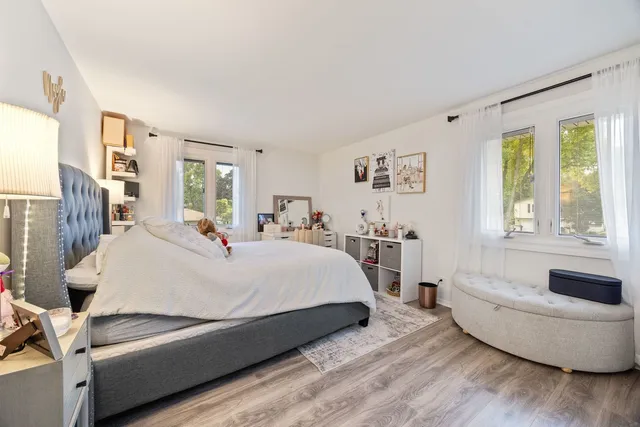 a bed room with a bed and a couch