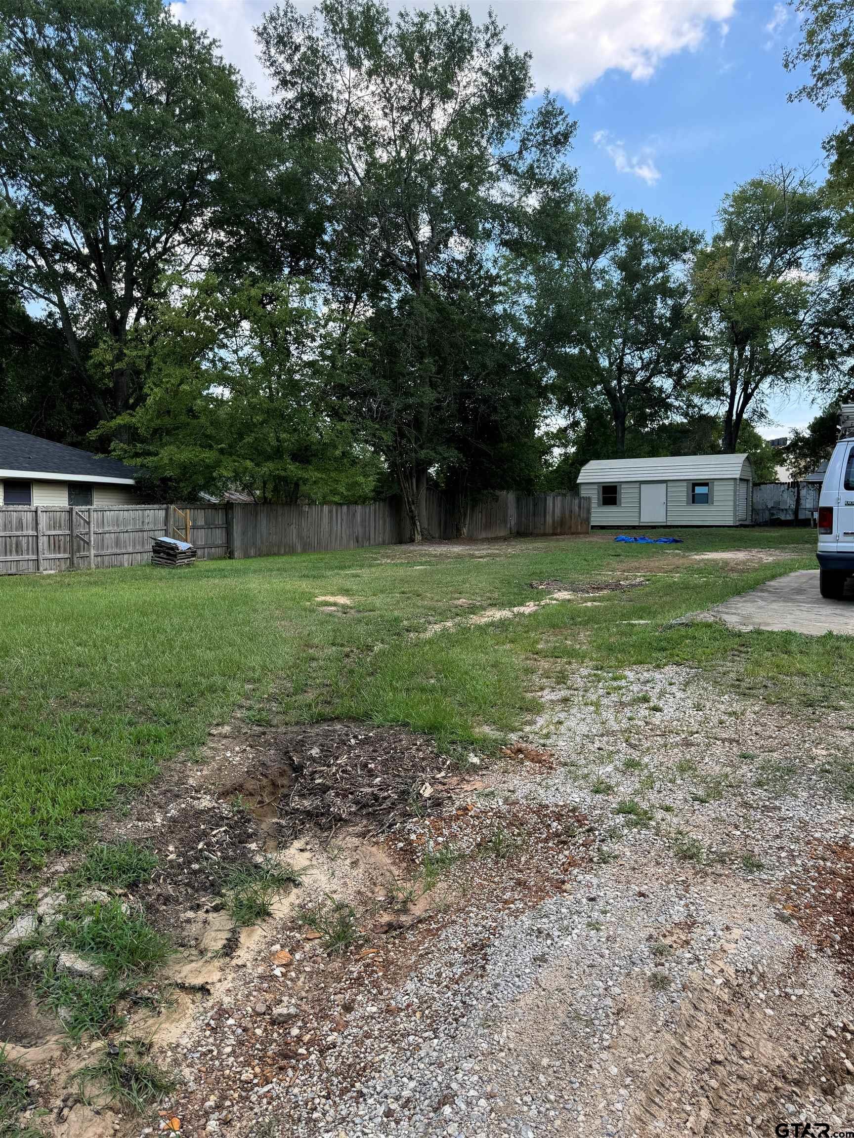 212 East Pirate Street Longview, TX 75604 - Photo 2 of 12 a view of a house with a yard