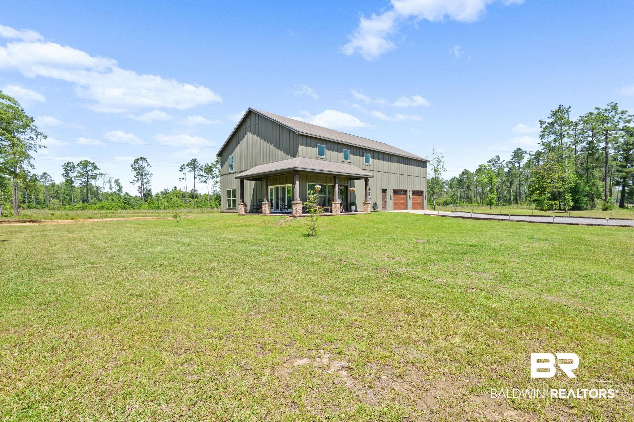 11025 Creax Road Axis, AL 36505 - Photo 4 of 45 Expansive property featuring a large grassy area