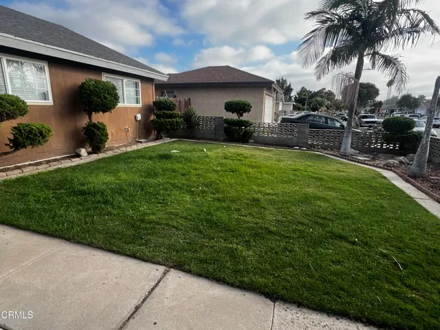 a couple of table and chairs in the garden