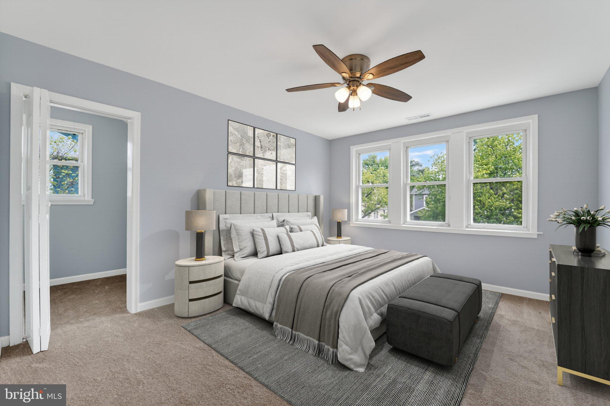 5312 Catalpha Road Baltimore, MD 21214 - Photo 59 of 59 a bedroom with a bed and window