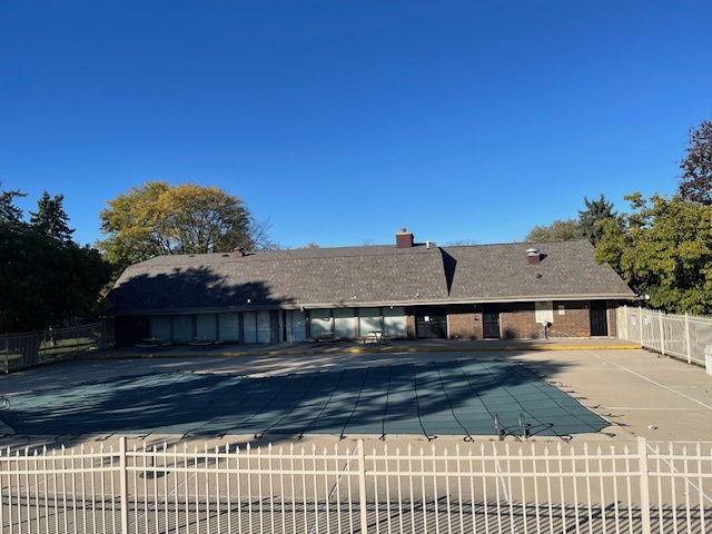 158 East Bailey Road, Unit F Naperville, IL 60565 - Photo 9 of 11 a front view of a house with a yard