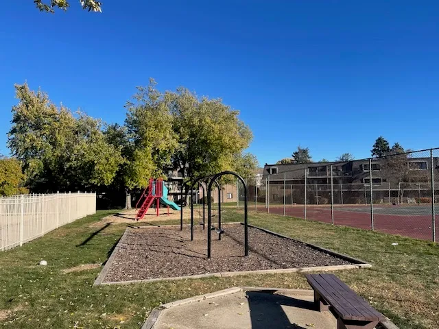 a view of a park with swings