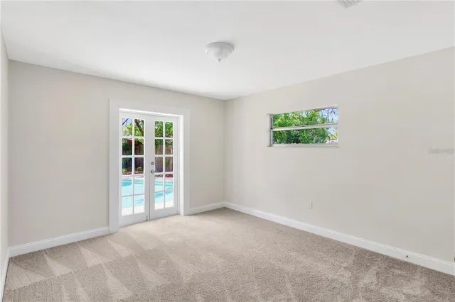 an empty room with windows