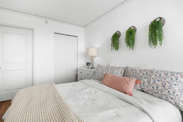a bathroom with a tub a sink and a mirror