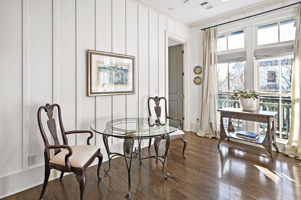 402 Prosper Circle, Unit 102 Marietta, GA 30060 - Photo 18 of 72 a view of a dining room with furniture and wooden floor