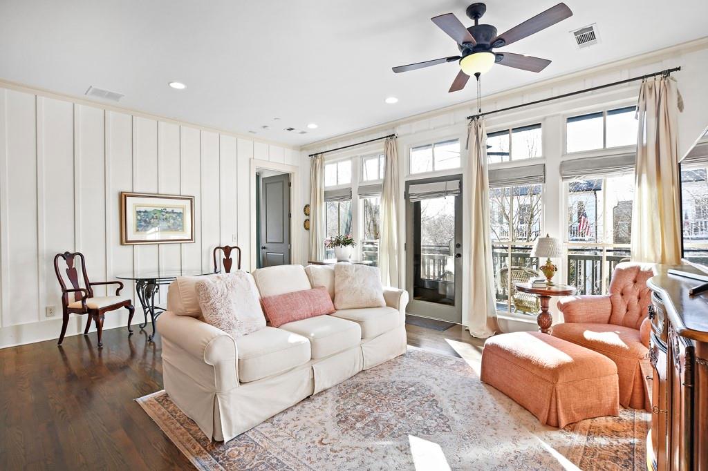402 Prosper Circle, Unit 102 Marietta, GA 30060 - Photo 3 of 72 a living room with furniture and a large window