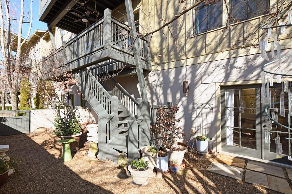 402 Prosper Circle, Unit 102 Marietta, GA 30060 - Photo 35 of 72 a view of a house with a yard