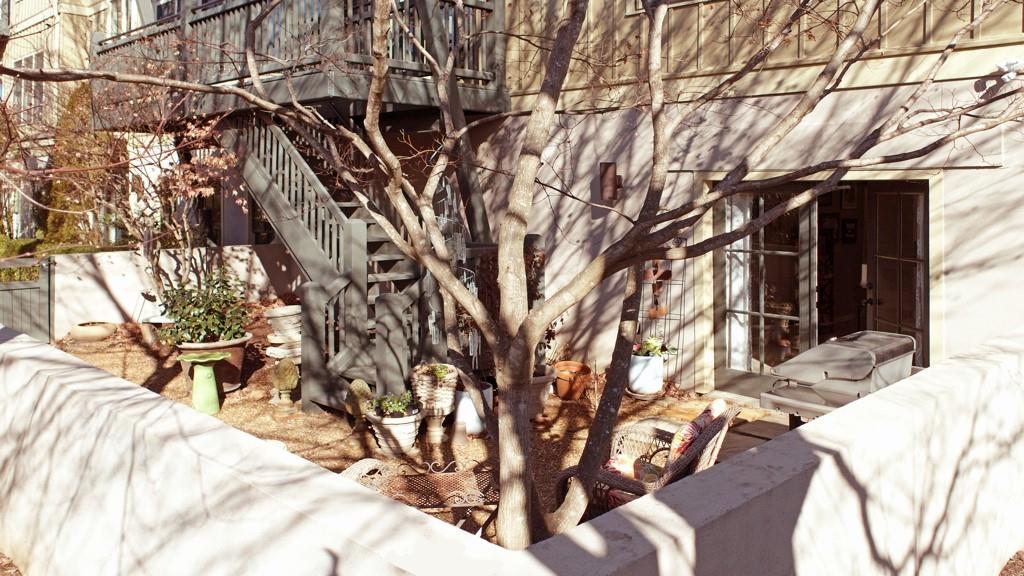 402 Prosper Circle, Unit 102 Marietta, GA 30060 - Photo 43 of 72 a view of tree in front of a house