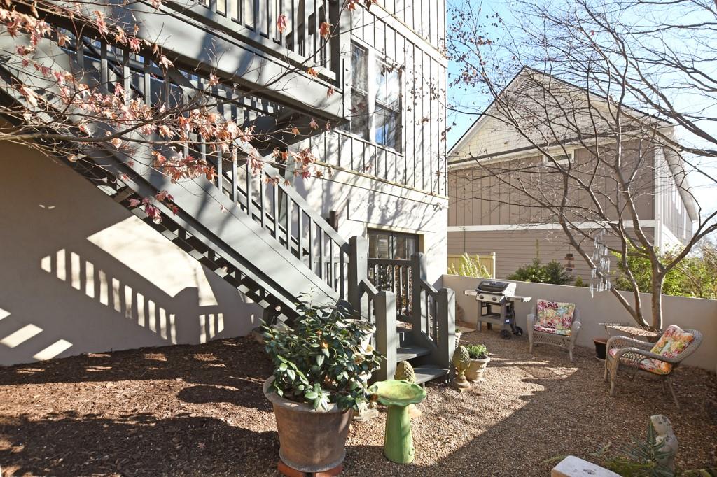 402 Prosper Circle, Unit 102 Marietta, GA 30060 - Photo 53 of 72 a view of a house with a yard