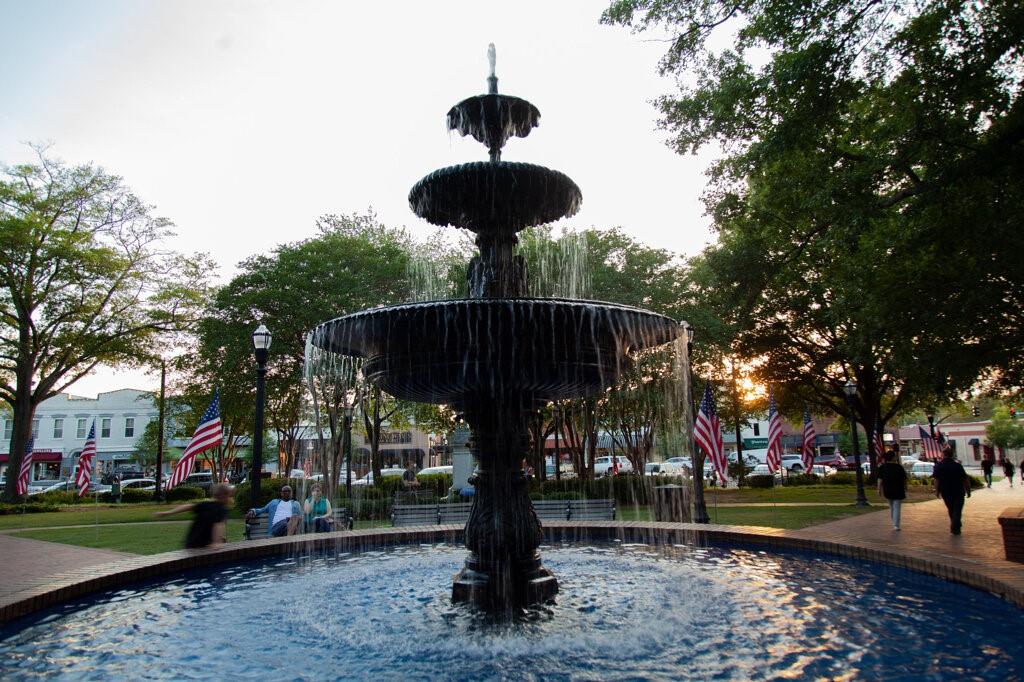 402 Prosper Circle, Unit 102 Marietta, GA 30060 - Photo 60 of 72 a front view of a house with a yard