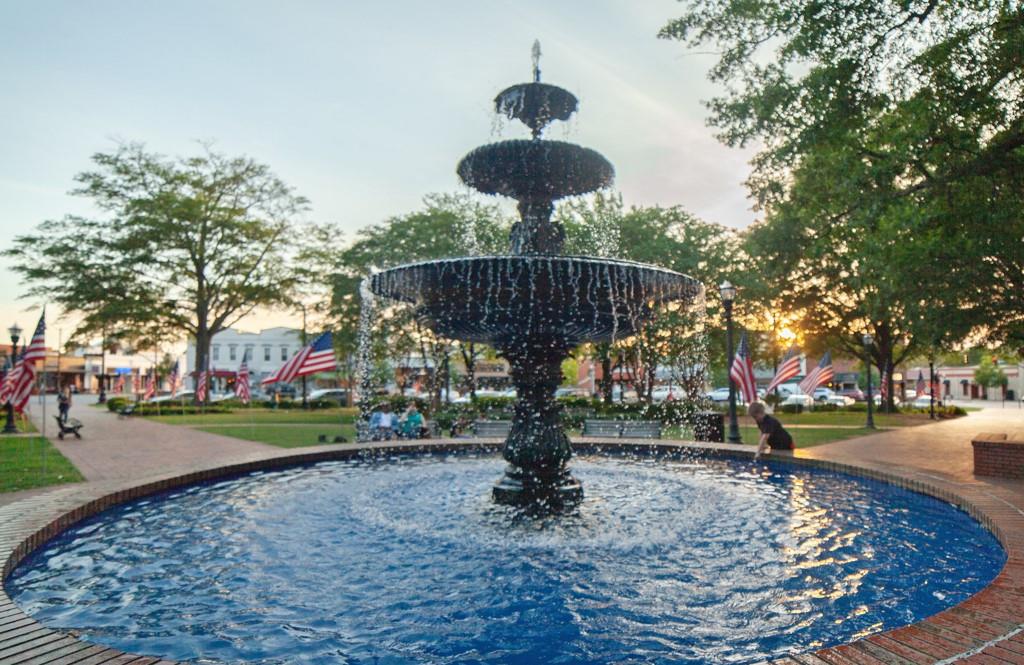 402 Prosper Circle, Unit 102 Marietta, GA 30060 - Photo 64 of 72 a front view of a house with a yard