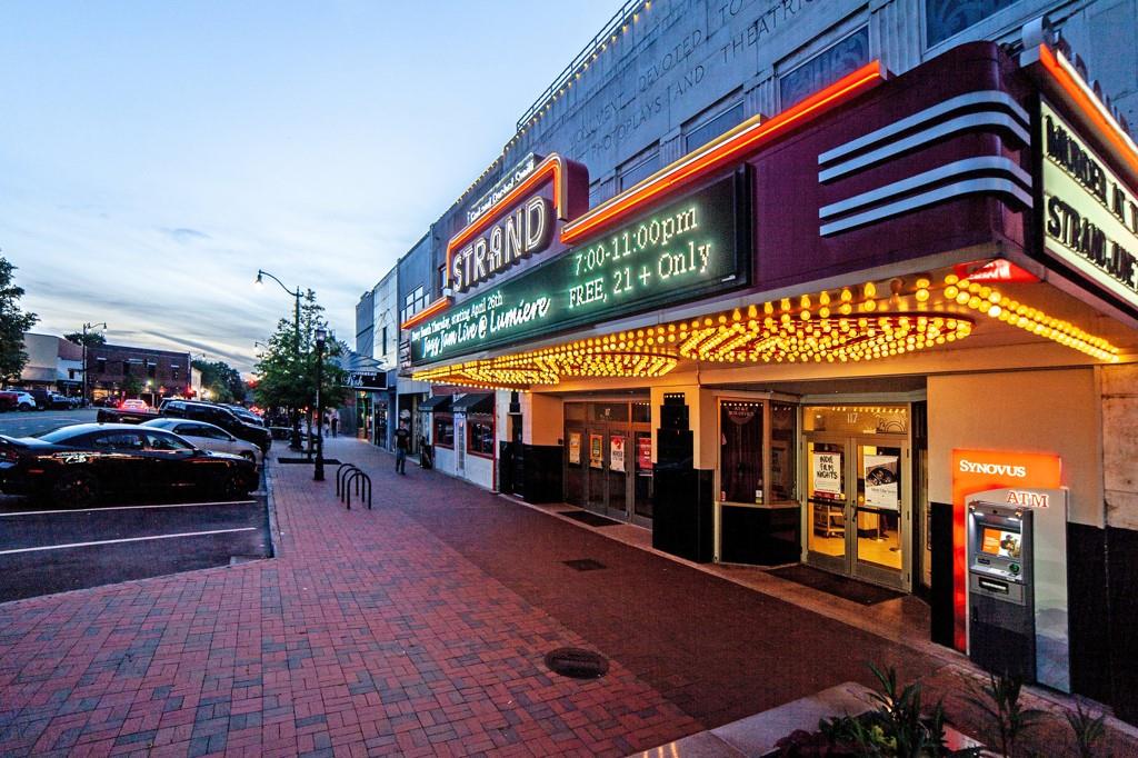 402 Prosper Circle, Unit 102 Marietta, GA 30060 - Photo 70 of 72 a front view of multi story building with retail shops