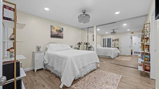 a bedroom with a bed and a table