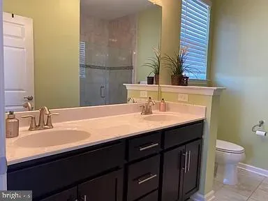 a bathroom with a sink and a toilet